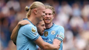 Erling Haaland mencetak gol saat Manchester City memulai mempertahankan gelar Liga Premier