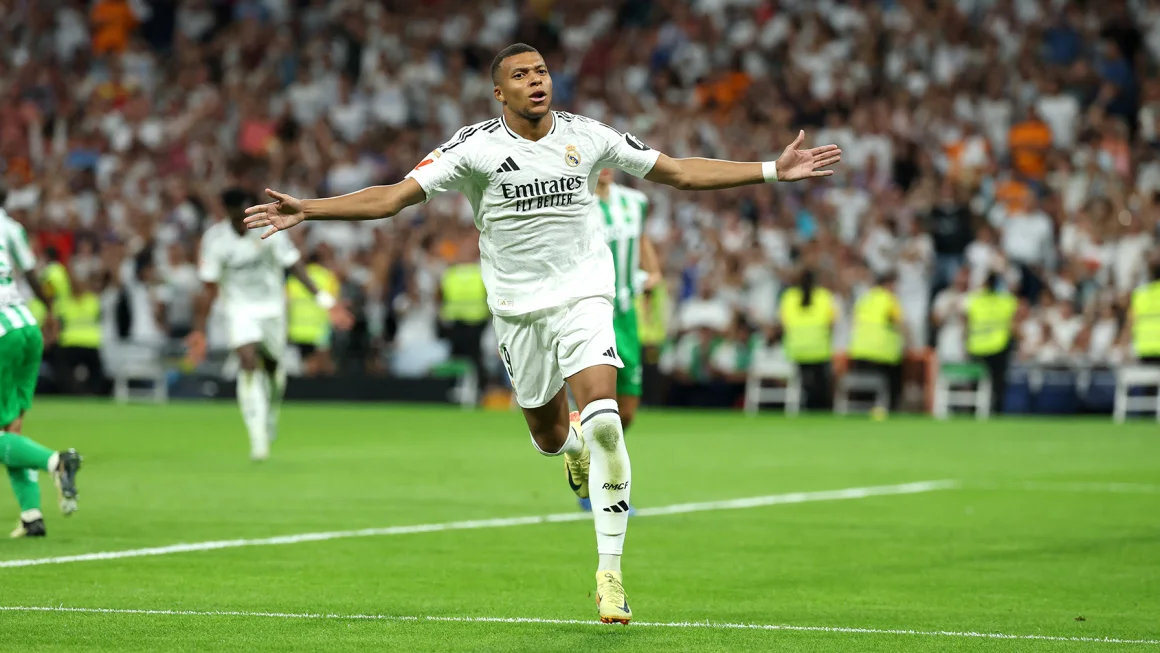 Kylian Mbappé mencetak gol liga pertamanya untuk Real Madrid dalam kemenangan melawan Real Betis